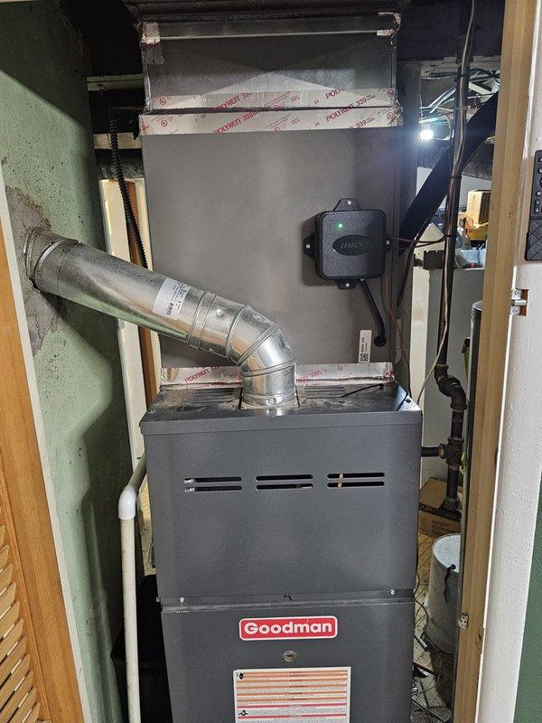 Completed full HVAC system installation including new single-stage condenser unit with upflow cased coil matched to existing Goodman furnace. Installed 3/4" x 40' lineset with new penetration drilled at condenser location for proper refrigerant line routing. Relocated electrical disconnect and whip to accommodate new equipment placement. Prepared new condenser pad with stone base, ensuring proper leveling and drainage. Upgraded to WiFi-enabled thermostat for enhanced system control and remote access capability. All refrigerant lines properly insulated, electrical connections completed to code, and system tested for proper operation including airflow verification and temperature differential measurements. Equipment startup confirmed optimal performance with all safety controls functioning as designed.