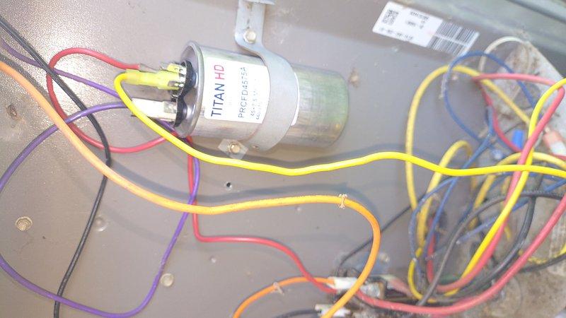 Responded to emergency no-cooling call with indoor temperature at 88 degrees. Diagnosed failed capacitor on outdoor condensing unit. Replaced defective TITAN capacitor with new unit, reconnected all electrical connections, and verified proper system operation. System restored to normal cooling function.