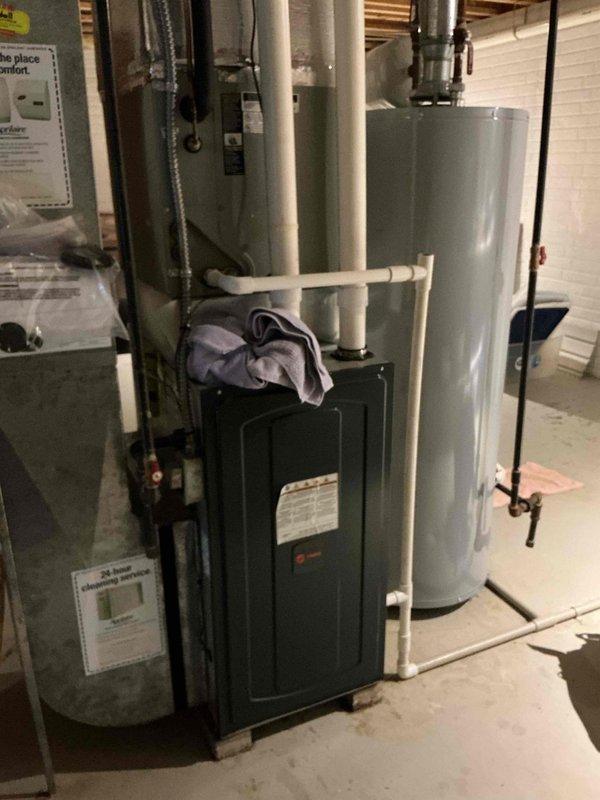 # HVAC Service Report

Responded to no cooling complaint on 20-year-old residential air conditioning system. Upon arrival, confirmed unit running continuously with inadequate cooling performance. Conducted visual inspection of outdoor condenser unit, noting significant age-related deterioration including rust staining on top grille and weathered cabinet paint. Inspected indoor air handler in basement mechanical room and verified airflow. Given the system's age at two decades—well beyond typical 15-year service life—and continuous runtime indicating compressor or refrigerant issues, advised customer that system has reached end of useful life and replacement is recommended over repair investment.