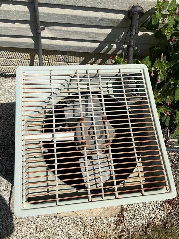 # HVAC Service Report

Responded to no cooling complaint on 20-year-old residential air conditioning system. Upon arrival, confirmed unit running continuously with inadequate cooling performance. Conducted visual inspection of outdoor condenser unit, noting significant age-related deterioration including rust staining on top grille and weathered cabinet paint. Inspected indoor air handler in basement mechanical room and verified airflow. Given the system's age at two decades—well beyond typical 15-year service life—and continuous runtime indicating compressor or refrigerant issues, advised customer that system has reached end of useful life and replacement is recommended over repair investment.