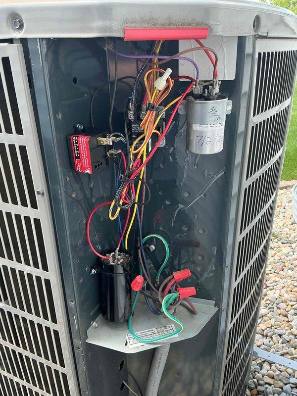 Responded to service call for 7-year-old air conditioning system not turning on, affecting cooling throughout entire home. Upon inspection of outdoor condensing unit, diagnosed failed capacitor preventing compressor and condenser fan motor operation. Replaced defective dual-run capacitor with proper MFD-rated component, verified all electrical connections secure, and tested system startup sequence. Unit now operating within normal parameters with proper cooling restoration to residence.