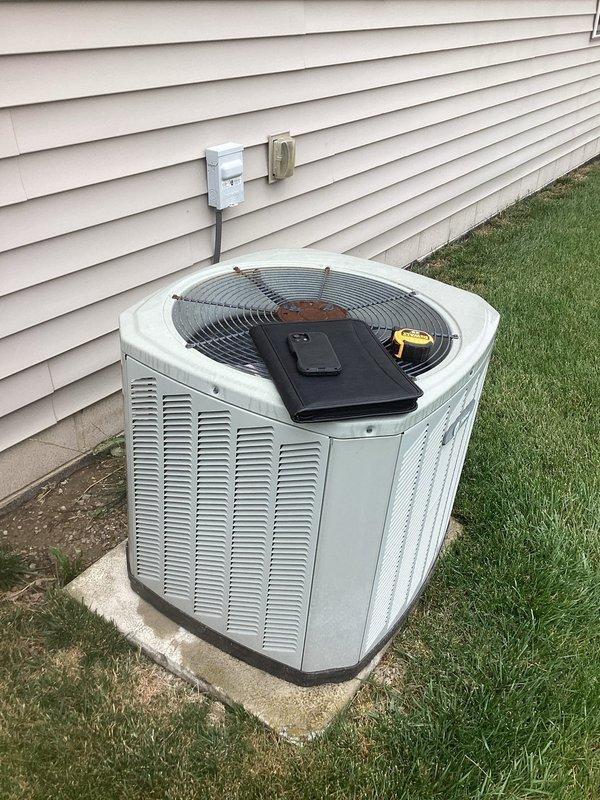 Completed comprehensive estimate for full HVAC system replacement at residential property. Evaluated existing outdoor air conditioning condenser unit mounted on concrete pad with electrical disconnect, along with indoor gas furnace and water heater configuration located in utility closet. Documented current equipment specifications, ductwork routing, and installation conditions through detailed photographic assessment to provide accurate replacement recommendations and system sizing requirements.