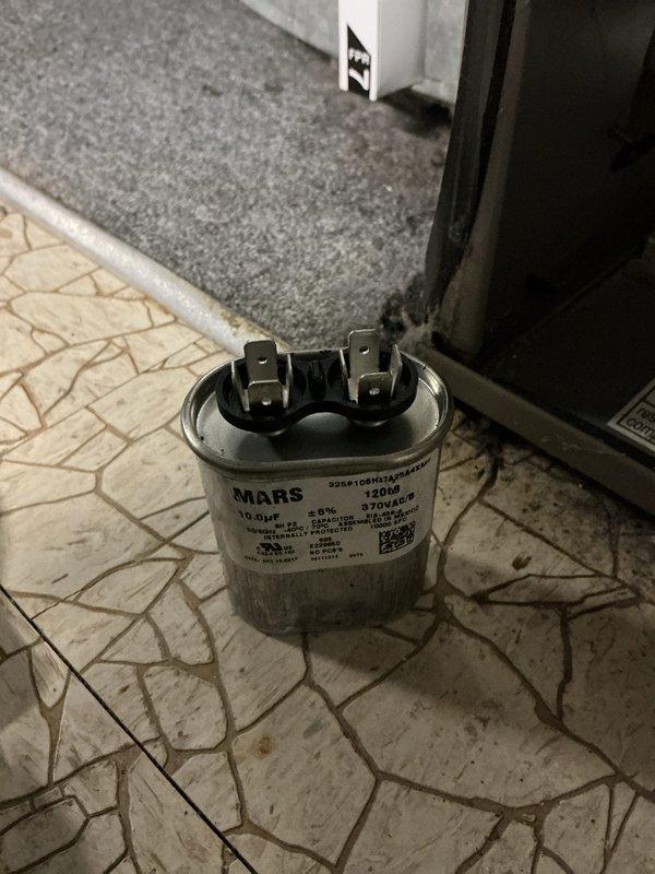 Completed cooling maintenance on 12-year-old HVAC system. Inspected equipment, verified proper airflow with 16x25x1 filter measurement, and examined dual-run capacitor rated at 370VAC showing normal wear consistent with system age. Unit operating within normal parameters.