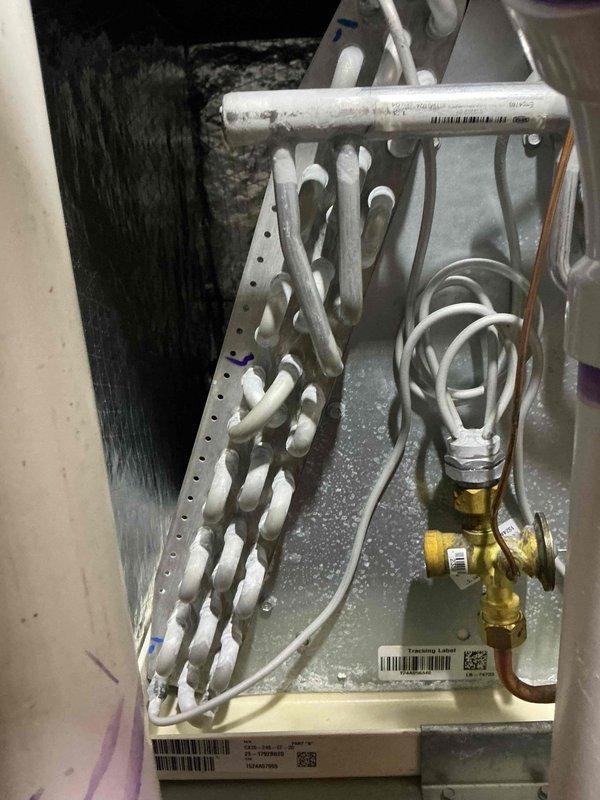 Completed scheduled cooling maintenance visit. Performed comprehensive inspection of evaporator coil assembly and internal HVAC components, utilizing inspection camera to examine heat exchanger fins and coil condition. Verified proper refrigerant line connections, checked for condensation accumulation, and documented system operation through visual inspection of all accessible components.