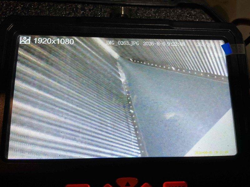 Completed scheduled cooling maintenance visit. Performed comprehensive inspection of evaporator coil assembly and internal HVAC components, utilizing inspection camera to examine heat exchanger fins and coil condition. Verified proper refrigerant line connections, checked for condensation accumulation, and documented system operation through visual inspection of all accessible components.