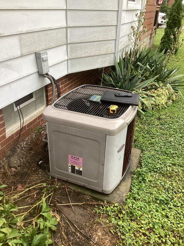 Completed comprehensive estimate for full HVAC system replacement at residential property. Evaluated existing Carrier furnace installation in basement utility area, including associated ductwork, plenum, and air handler components. Assessed outdoor condensing unit utilizing R-410A refrigerant positioned on concrete pad adjacent to home exterior. Documented current system configuration, equipment specifications, and installation conditions through detailed photographic documentation to provide accurate replacement recommendations and equipment sizing requirements.