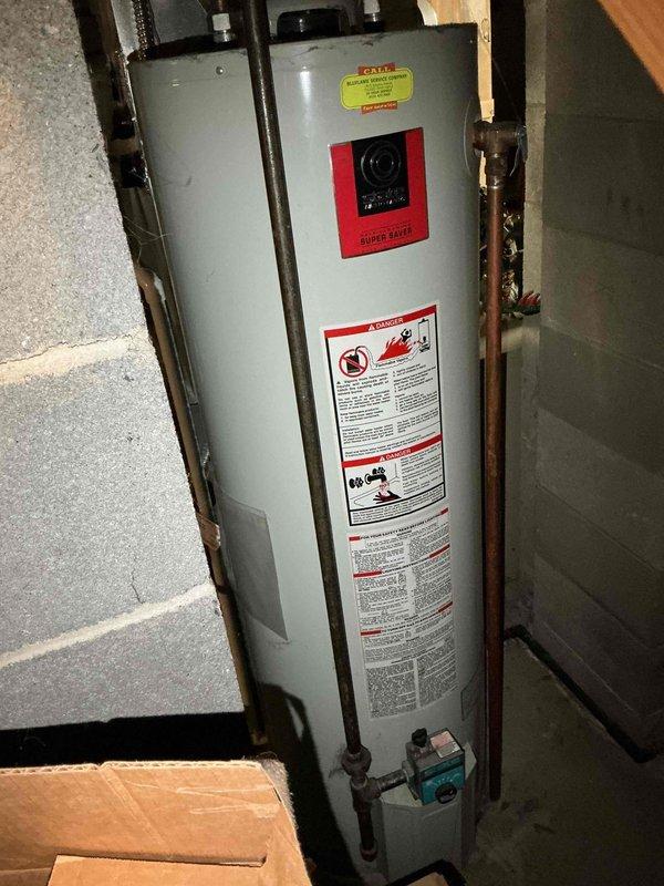 Responded to no-cooling call on residential AC unit. Customer had already replaced both 40-amp fuses with no improvement. Upon arrival, removed outdoor unit access panel and performed diagnostic inspection of condensing unit components. Examined electrical connections, capacitor, compressor, and associated wiring throughout upper and lower compartments. Verified refrigerant line connections and valve assemblies. Unit showed signs of age-related wear with dirt accumulation on interior surfaces. Documented condition of all major components including compressor, capacitor, electrical connections, and copper refrigerant lines for service records.