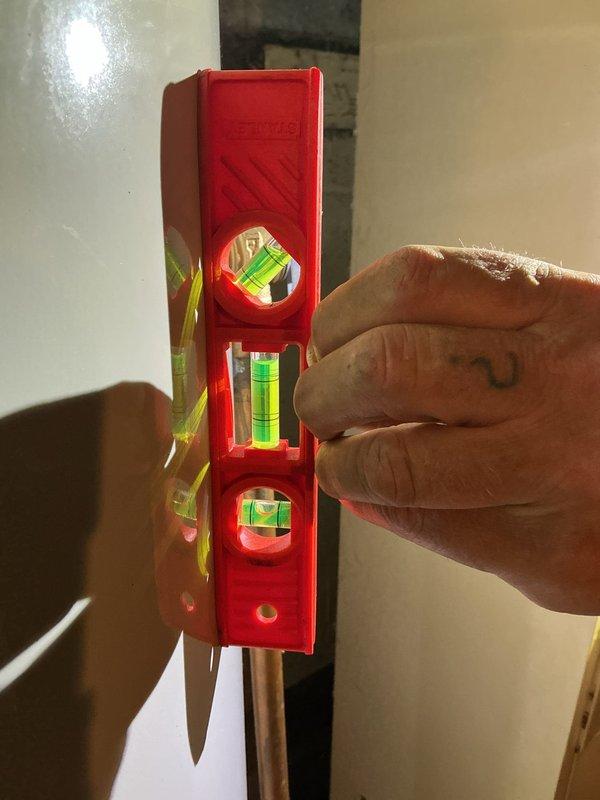 Installed 50-gallon tanked water heater in basement mechanical room. Unit was properly leveled, copper supply lines connected, and all connections verified for secure installation per manufacturer specifications and local plumbing codes.