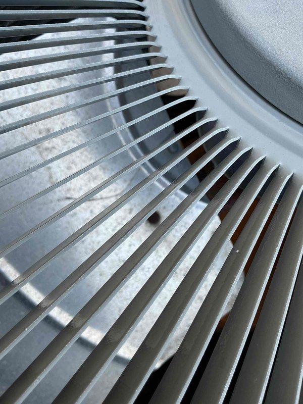 Responded to no cool complaint on 2-year-old air conditioning system that was not reaching thermostat setpoint following previous service visit. Performed diagnostic inspection of outdoor condenser unit, examining condenser coil fins for airflow restrictions and potential efficiency issues. Documented coil condition with photos showing minor dirt accumulation on fins but overall acceptable cleanliness. Evaluated system operation, refrigerant levels, and electrical components to identify root cause of inadequate cooling performance.