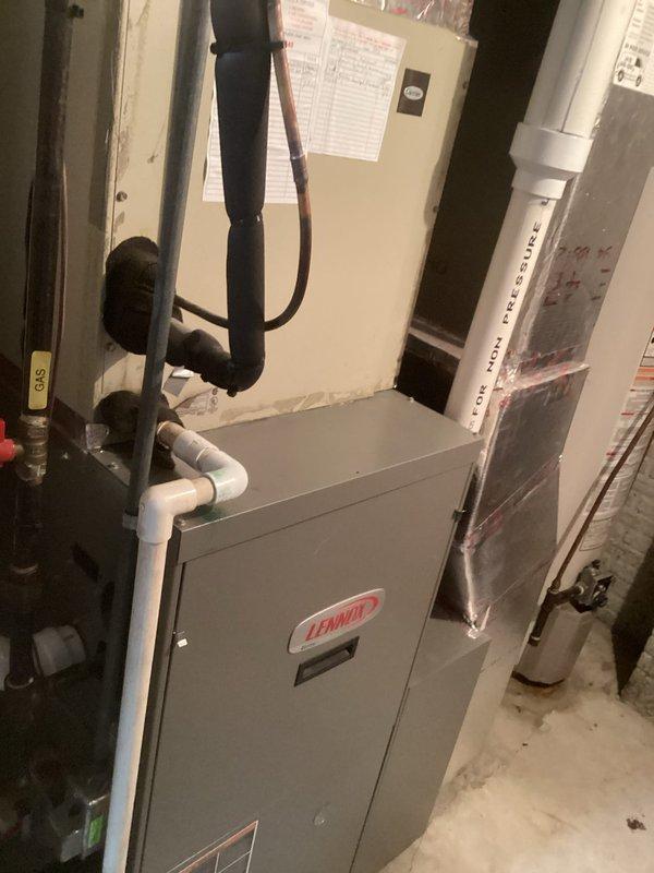 Conducted comprehensive site evaluation for complete HVAC system replacement at residential property. Assessed existing outdoor condensing unit positioned on concrete pad with landscape rock surround, noting electrical conduit, junction box, and PVC drainage lines. Documented current equipment specifications and clearance requirements for replacement unit installation.

Evaluated indoor components including existing Lennox furnace and air handler system located in mechanical room. Examined ductwork configuration, condensate drainage system, gas line connections, and electrical supply routing. Prepared detailed estimate for complete system replacement including new high-efficiency condensing unit, compatible furnace or air handler, necessary electrical upgrades, refrigerant line sets, and condensate drainage modifications to meet current code requirements.