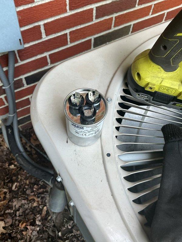 Responded to service call for air conditioning unit not operating properly. Upon inspection, diagnosed failed dual-run capacitor as the cause of system malfunction. Removed defective capacitor and installed new replacement unit with proper microfarad rating. Verified all electrical connections were secure, tested system operation, and confirmed air conditioner returned to normal cooling function.