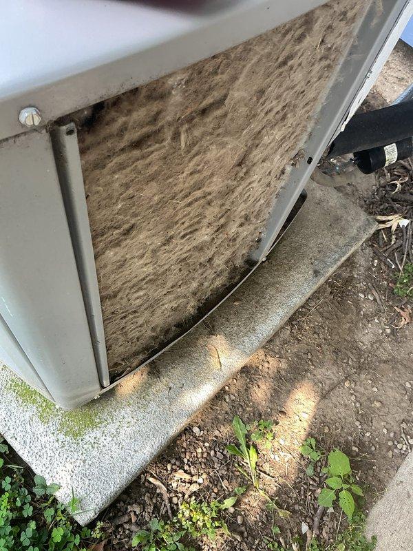Responded to service call for 12-year-old air conditioning system experiencing short cycling. Upon inspection, discovered heavily clogged air filter with excessive dust and debris accumulation causing restricted airflow and improper system operation. Replaced dirty filter, cleaned condenser unit exterior, and verified proper system operation. Unit now running smoothly with normal cooling cycles restored.
