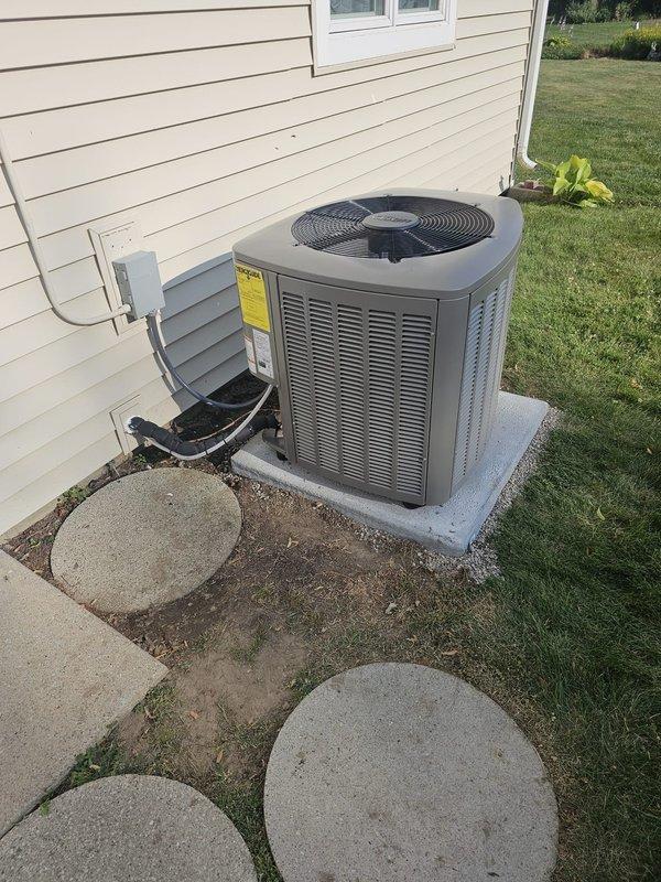 Completed full HVAC system installation including Lennox EL16 condenser unit, Elite Series downflow cased coil with lift box, and downflow furnace with 5" filter rack. Installed new 3/4" x 40' refrigerant line set, concrete equipment pad, electrical disconnect and whip, and S-40 thermostat. All equipment positioned on new concrete pad with proper clearances, refrigerant lines charged and tested for leaks, condensate drain piping installed, and electrical connections completed per manufacturer specifications. System tested and verified operational with proper airflow, temperature differential, and refrigerant pressures within normal parameters.