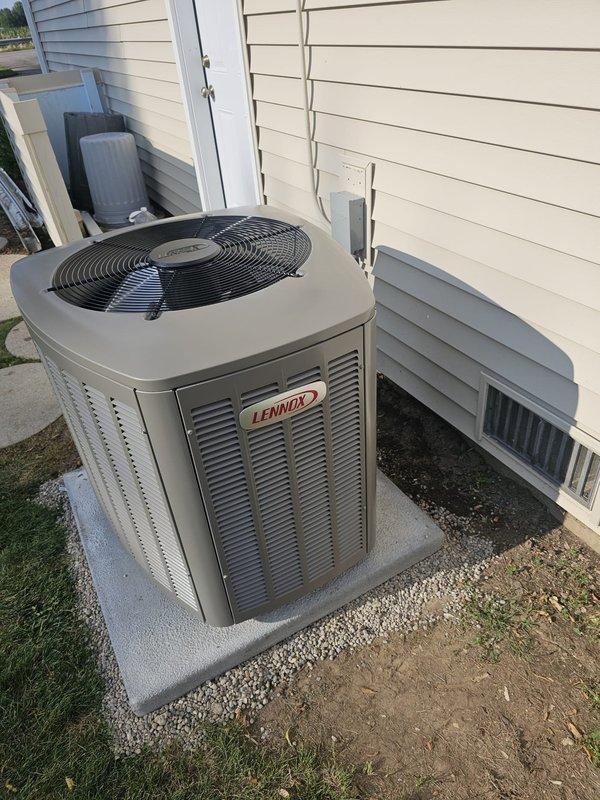 Completed full HVAC system installation including Lennox EL16 condenser unit, Elite Series downflow cased coil with lift box, and downflow furnace with 5" filter rack. Installed new 3/4" x 40' refrigerant line set, concrete equipment pad, electrical disconnect and whip, and S-40 thermostat. All equipment positioned on new concrete pad with proper clearances, refrigerant lines charged and tested for leaks, condensate drain piping installed, and electrical connections completed per manufacturer specifications. System tested and verified operational with proper airflow, temperature differential, and refrigerant pressures within normal parameters.