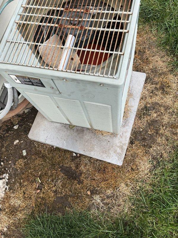 Responded to service call for air conditioning unit repeatedly tripping the electrical breaker. Upon arrival, inspected outdoor condenser unit and found older model system with signs of wear but generally intact housing and components. Diagnosed electrical issue causing overcurrent condition and breaker trips. Completed necessary repairs to resolve the tripping issue and restore normal system operation.