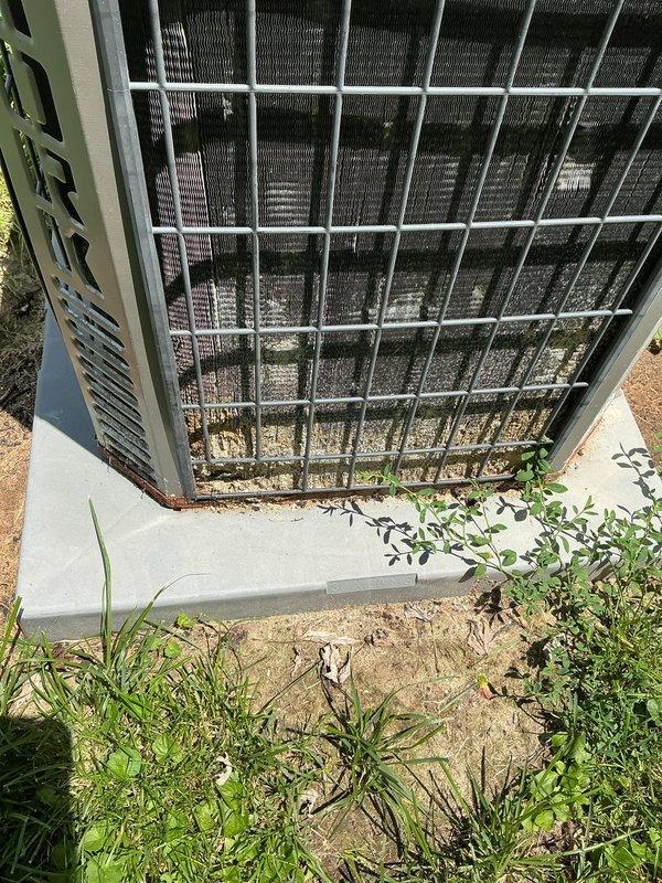 # HVAC Service Call - No Cooling Condition

Responded to service call for residential air conditioning system not operating. Unit is 20+ years old and located in backyard on concrete pad.

## Findings

Upon arrival, performed visual inspection of outdoor condenser unit. Found system completely non-operational with no power to unit. Condenser coils exhibited significant dirt and debris accumulation throughout, restricting airflow. Unit housing showed extensive weathering and age-related deterioration consistent with equipment exceeding normal service life expectancy.

## Actions Taken

Checked electrical connections at disconnect and confirmed no power supply to condenser. Tested contactor, capacitor, and compressor windings. Found dual run capacitor failed with zero microfarad reading on compressor terminal. Contactor contacts showed severe pitting and carbon buildup from years of operation.

Cleaned condenser coils using approved coil cleaner and low-pressure water rinse to remove acc