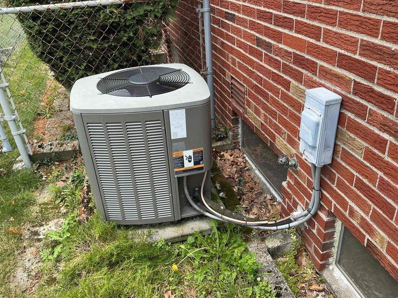 Completed maintenance inspection on 15-year-old residential air conditioning system per MVP cooling service agreement. Addressed customer concern regarding fan noise by inspecting condenser unit and verified proper operation of blower motor and dual-run capacitor (40+5µF JARD brand). Replaced air filter as requested and confirmed system cooling functionality. Unit operational with no immediate safety concerns identified.