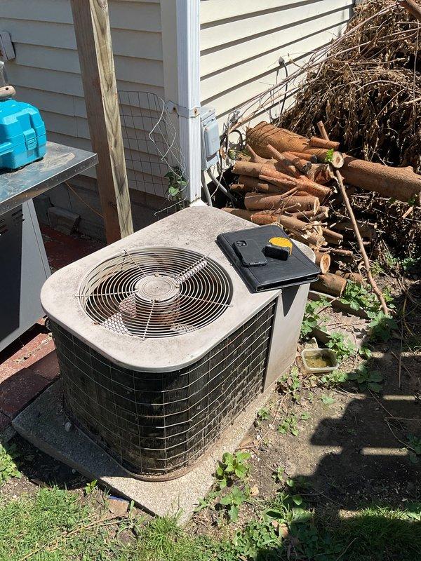Conducted comprehensive assessment of existing HVAC system for complete replacement estimate. Evaluated outdoor condensing unit located on concrete pad adjacent to building exterior, noting equipment age, condition, and operational status. Inspected indoor air handler and furnace system in basement mechanical room, including existing ductwork configuration and insulation. Documented current system specifications, measured installation area clearances, and photographed equipment for replacement planning. Provided detailed estimate for new AC system installation including outdoor condenser unit, indoor components, refrigerant line sets, electrical connections, and necessary modifications to ensure proper system operation and code compliance.