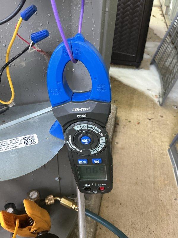 Completed routine maintenance on a 3-year-old air conditioning system. Inspected and tested electrical components including disconnect box with fuses, verified amperage readings using clamp meter, checked all electrical connections and wiring. System operating within normal parameters upon completion of preventive maintenance service.