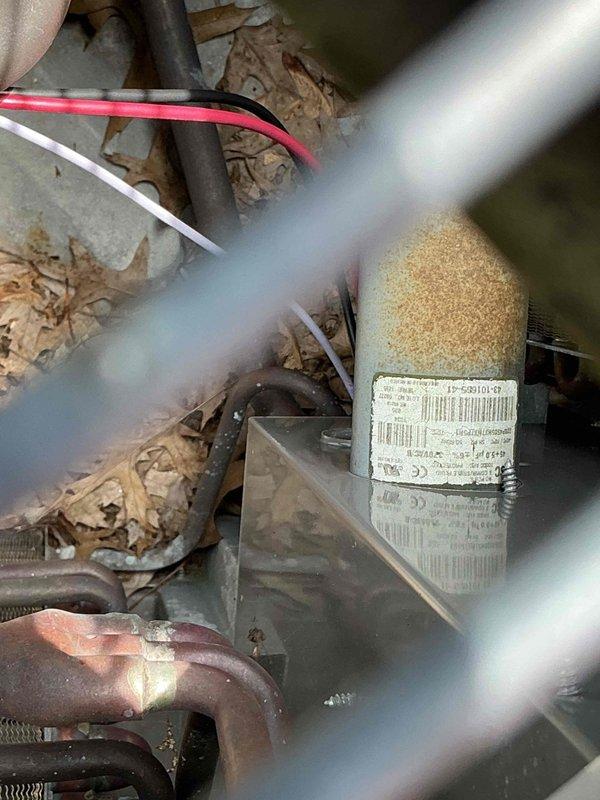 Completed preventative maintenance on 12-year-old Rheem air conditioning system. Performed system inspection with access panel removal, checked electrical connections and capacitor condition, and verified proper operation of all components. Unit showed normal wear with some dust accumulation; all electrical connections secure and refrigerant lines intact.