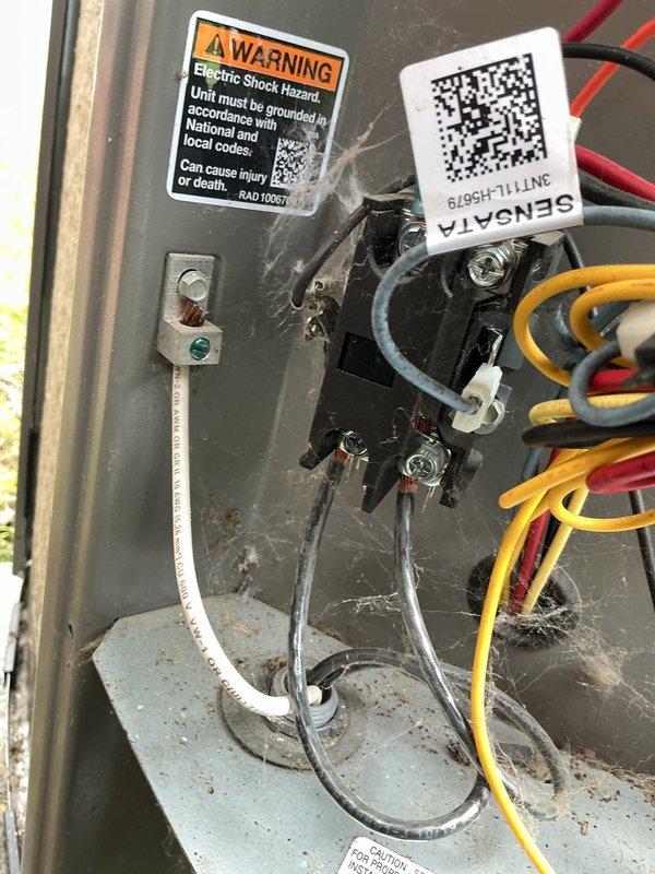 Performed routine air conditioning maintenance on 5-year-old system. Measured electrical current draw using clamp meter, reading 5.10 amps, and inspected all electrical connections, terminals, and capacitor within the outdoor unit. All components found operating within normal parameters; no repairs required at this time.