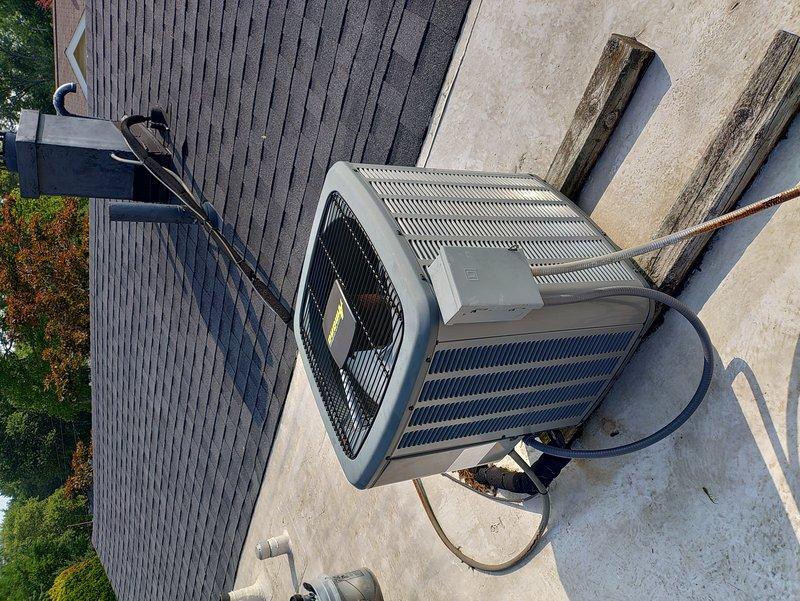 Completed preventive maintenance tune-up on a 5-year-old rooftop HVAC system, accessing the outdoor condenser unit via ladder and inspecting the indoor air handler through its access panel. Performed standard maintenance procedures including system inspection, cleaning, and operational testing to ensure proper cooling performance and efficiency of both the condensing unit and air handler components.