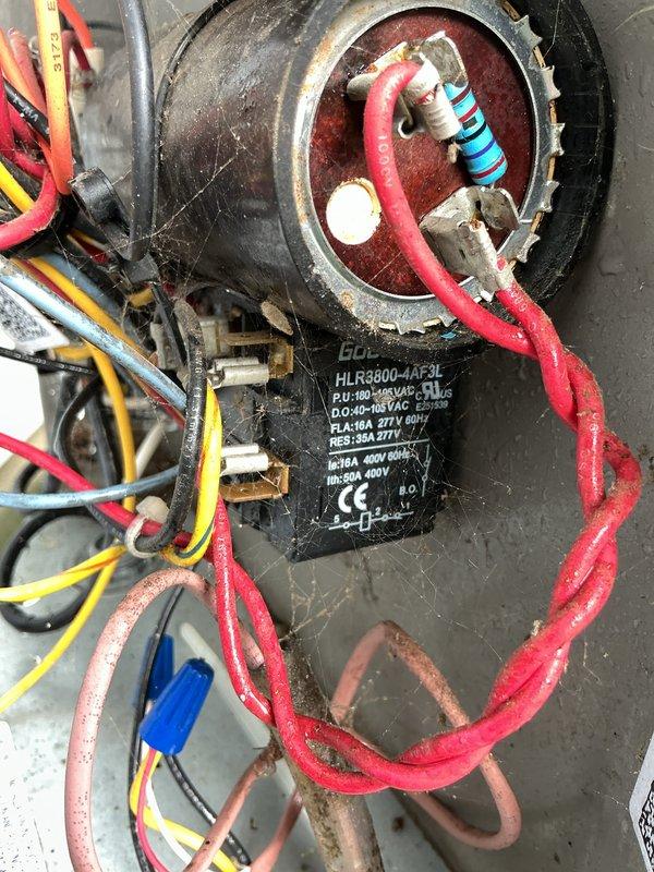 Completed routine air conditioning maintenance on a 5-year-old system. Inspected electrical components including capacitor and motor connections, verified proper wiring and terminal integrity, and cleared debris from outdoor unit area to ensure adequate airflow and system performance.