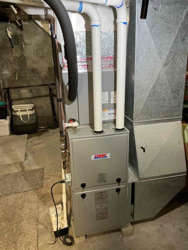 Responded to no cooling call on 8-year-old residential air conditioning system. Customer reported outdoor condenser fan not operating. Upon inspection, found outdoor unit with inoperative condenser fan motor preventing proper heat rejection and airflow. Diagnosed failed fan motor, replaced component, and restored system to normal operation. Verified proper amperage draw, confirmed adequate airflow through condenser coil, and tested system through complete cooling cycle with satisfactory performance.