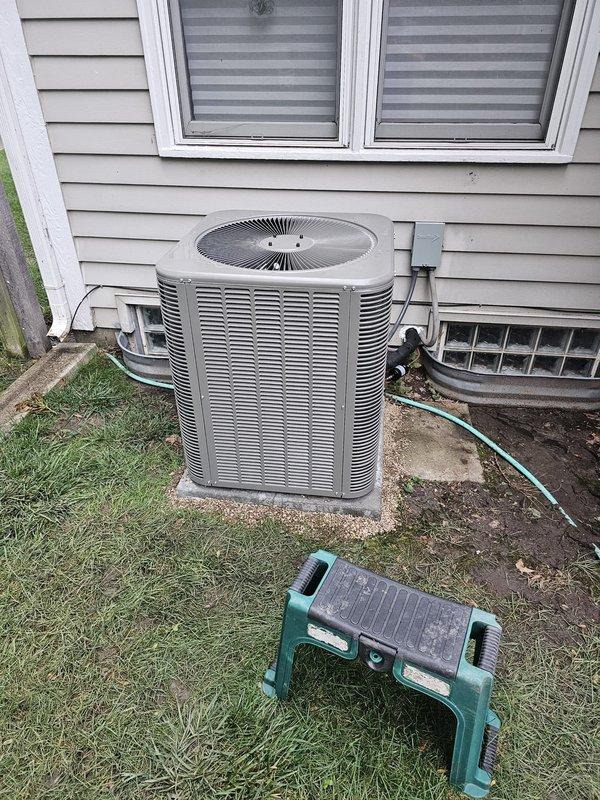 Completed full HVAC system installation including an 80% efficiency upflow furnace with matched upflow cased evaporator coil in the basement utility area. Installed new refrigerant lineset connecting the indoor and outdoor units, along with a single-stage air conditioning condenser positioned on a new concrete equipment pad against the exterior of the home. Added a 12-gallon bypass humidifier to the ductwork for whole-home humidity control. Installed new electrical disconnect and whip for code-compliant condenser power supply. Upgraded the system controls with a WiFi-enabled thermostat for remote monitoring and temperature management. All equipment was properly positioned, leveled, and secured according to manufacturer specifications and local building codes. System was pressure tested, evacuated, charged to factory specifications, and cycled through multiple heating and cooling operations to verify proper performance of all components.