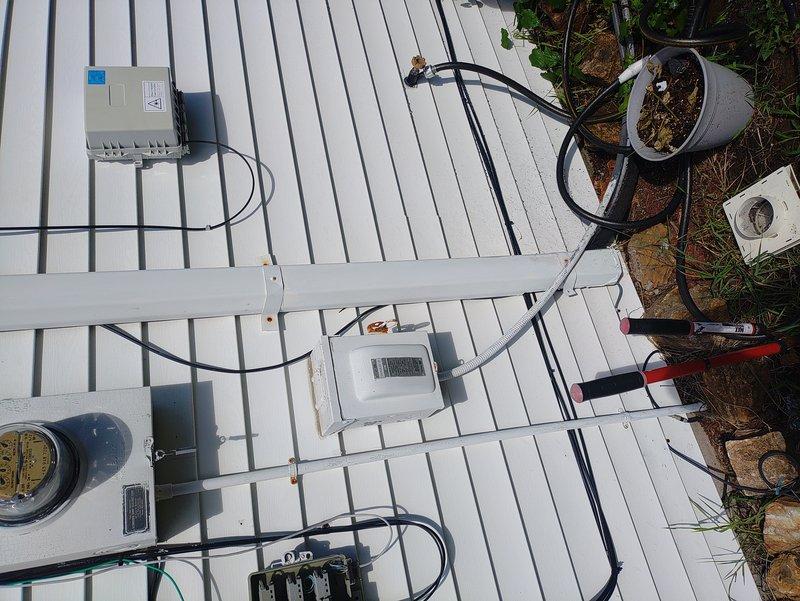 Responded to no cooling complaint on Lennox model WIN14ACX-024-230-01 unit containing R-410A refrigerant. Upon arrival, performed diagnostic assessment of outdoor condensing unit and associated electrical components including disconnect box and control systems. Unit specifications indicated 208-230V electrical service with 13.4 RLA compressor rating. Documented equipment condition and electrical connections at outdoor unit location and service disconnect panel for further evaluation and repair scheduling.