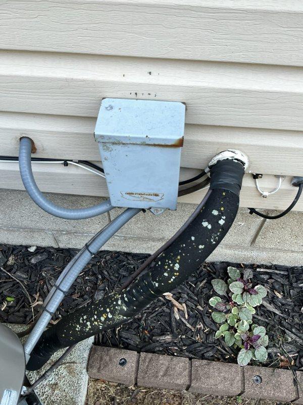 Completed annual AC tune-up on 11-year-old air conditioning system. Performed comprehensive maintenance inspection including checking refrigerant levels, cleaning condenser coils, testing electrical connections, verifying proper airflow, and inspecting outdoor disconnect panel and conduit connections. System operating within normal parameters with no issues identified.