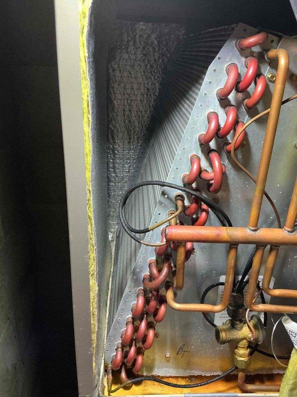 Completed scheduled maintenance on 11-year-old air conditioning system. Inspected evaporator coil and refrigerant lines, verified proper operation of all components including copper piping connections, brass fittings, and insulation integrity. System operating within normal parameters with all safety checks passed.
