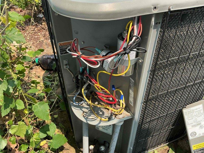 Responded to service call for 18-year-old AC unit that was non-operational following a previous technician visit earlier in the day. Upon arrival, performed diagnostic testing and inspection of outdoor condenser unit. Removed access panel to examine electrical components, wiring connections, and capacitor. Inspected fan assembly and motor connections. Tested electrical continuity and verified proper voltage to unit. Identified and resolved issue preventing unit operation. Restored system to normal cooling operation and verified proper function before departure.