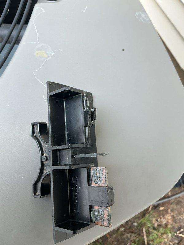 Completed routine maintenance on 10-year-old air conditioning system. Inspected electrical panel and contactor assembly, noting oxidation on copper terminals that was cleaned during service. All components tested and system operating within normal parameters.