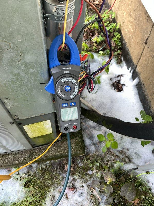 Completed preventative maintenance on 14-year-old residential air conditioning system located in backyard. Performed electrical diagnostics using clamp meter to verify proper amperage draw and system performance. Inspected capacitor, wiring connections, and terminal blocks for signs of wear or deterioration. All electrical connections were found secure with proper wire management in place. System operational and functioning within normal parameters at time of service completion.