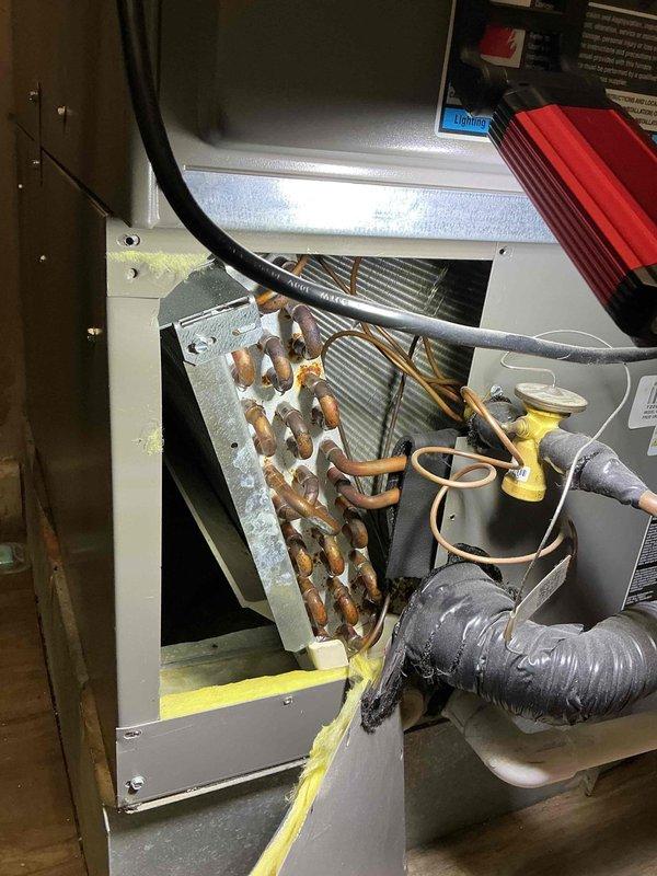 Completed annual warranty maintenance service on a 4-year-old air conditioning system. Performed comprehensive AC tune-up including inspection of evaporator coil assembly, refrigerant lines, and electrical components. System tested and confirmed to be operating within normal parameters with all components functioning properly.