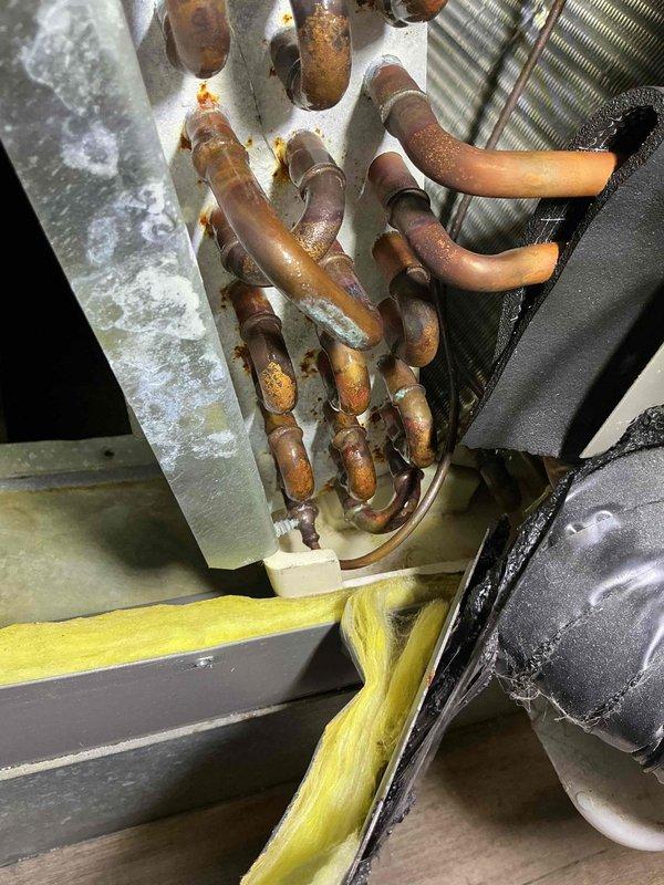 Completed annual warranty maintenance service on a 4-year-old air conditioning system. Performed comprehensive AC tune-up including inspection of evaporator coil assembly, refrigerant lines, and electrical components. System tested and confirmed to be operating within normal parameters with all components functioning properly.