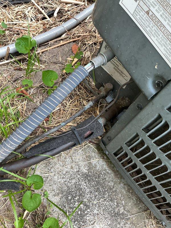 Completed preventive maintenance on 13-year-old residential air conditioning system. Performed standard tune-up procedures including electrical testing with clamp meter, verifying proper amperage draw on compressor circuit, and visual inspection of outdoor condensing unit and refrigerant connections. Unit operating within normal parameters; no issues found.