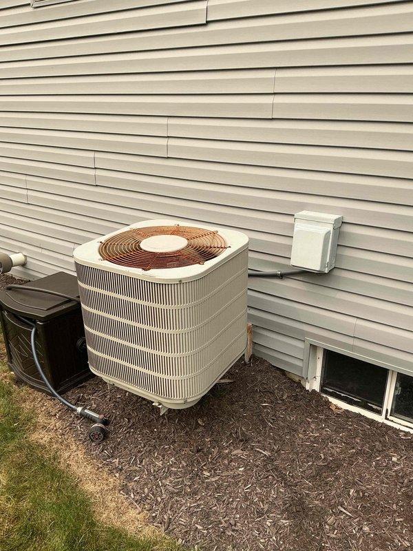 Responded to service call for 15-year-old central air conditioning system not operating properly. Upon arrival, performed comprehensive diagnostic evaluation of outdoor condensing unit and associated components. Inspected condenser coil, compressor operation, refrigerant lines, electrical connections, and disconnect switch. Identified and resolved operational issue preventing proper system function. Unit tested successfully and confirmed return to normal cooling operation.
