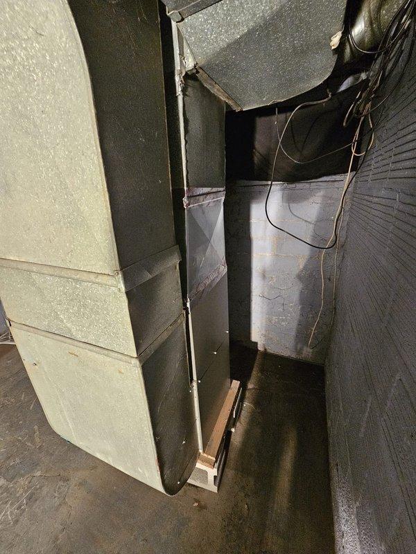 Installed an 80% efficiency, 70,000 BTU upflow furnace elevated on 8-inch support blocks with new sheet metal ductwork connections and programmed a new thermostat. Verified proper level and alignment of the unit during installation to ensure optimal performance and drainage. Completed all electrical connections and tested system operation to confirm heating functionality.