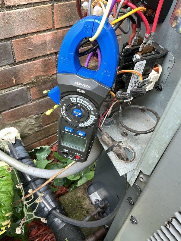 # HVAC Cooling Maintenance Summary

Performed comprehensive preventive maintenance on a 10-year-old air conditioning system. Conducted electrical diagnostics using clamp meter to verify proper amperage draw and system performance at the outdoor condensing unit. Inspected and confirmed clean air filter condition at the indoor air handler unit. All electrical connections, refrigerant lines, and system components operating within normal parameters.

# Detailed Service Description

Arrived on-site during the scheduled morning service window to perform routine cooling maintenance on an aging residential air conditioning system. Upon arrival, conducted visual inspection of both indoor and outdoor equipment to assess overall system condition and identify any immediate concerns.

**Outdoor Unit Service:**
Performed electrical testing at the condensing unit using a digital clamp meter to measure current draw on the compressor and fan motor circuits. Attached the clamp meter to the wire bundle a