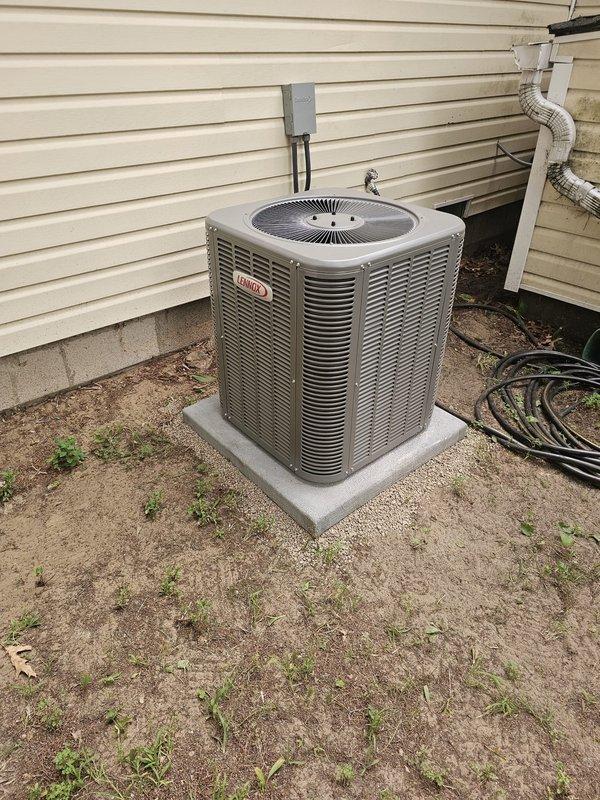 Completed full HVAC system installation including new Lennox single-stage air conditioning condenser unit, downflow cased evaporator coil, and all associated components. Installed new concrete equipment pad, ran new refrigerant lineset with proper insulation, mounted new electrical disconnect box and whip connection, and coordinated installation of dedicated electrical circuit to meet code requirements. System commissioned and tested successfully with 10-year parts and labor warranty coverage in effect.