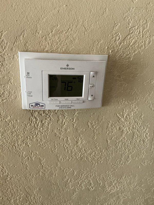 Responded to emergency service call for carbon monoxide alarm activation and strong odor reported in furnace room area. Upon arrival, verified thermostat operation and conducted thorough safety inspection of heating system and surrounding areas. Removed old humidifier unit and debris from furnace room that was contributing to odor concerns. Tested carbon monoxide levels throughout the home and confirmed safe readings after ventilation and removal of problematic items. System found to be operating safely with no gas leaks or combustion issues detected.
