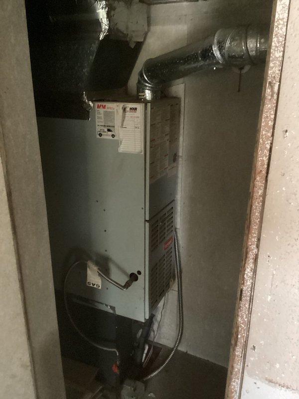 Completed comprehensive estimate for full HVAC system replacement including both furnace and air conditioning units. Assessed existing basement-installed furnace with flexible duct connections and condensate drainage system, along with outdoor condensing unit mounted on concrete pad with electrical disconnect. Documented current equipment condition, measured installation space constraints, photographed existing components, and provided replacement recommendations for complete heating and cooling system upgrade.