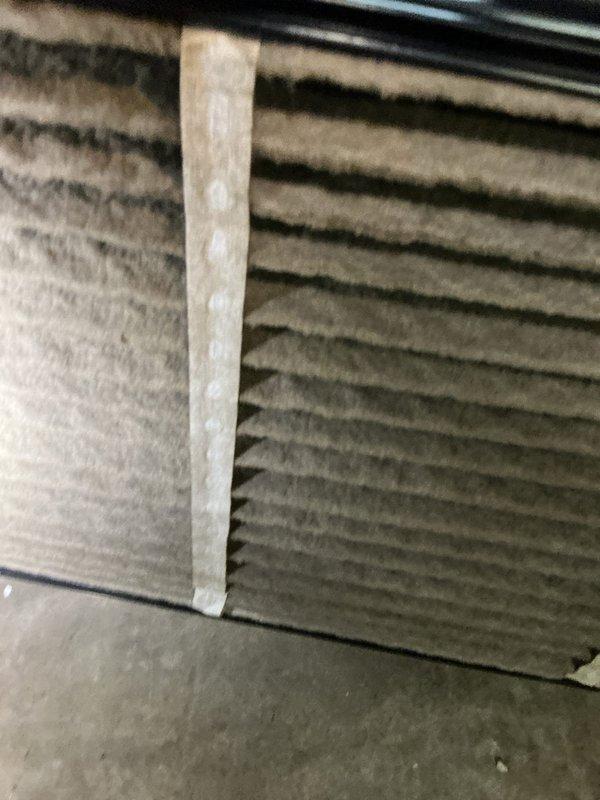 Performed seasonal tune-up on 12-year-old air conditioning system. Inspected outdoor condensing unit, examined evaporator coil fins for debris accumulation, and checked air filter condition. All components found operating within normal parameters with routine dust buildup noted on filtration media and coil surfaces.
