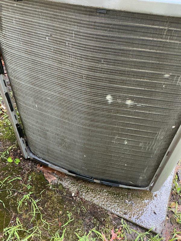 Completed annual air conditioning maintenance and tune-up on residential outdoor condenser unit. Performed comprehensive system inspection, changed air filter, and verified proper operation of all components including electrical disconnect, fuses, and refrigerant lines. Unit showed normal wear with accumulated dirt and debris on condenser coils; system operating within specifications with no issues identified.