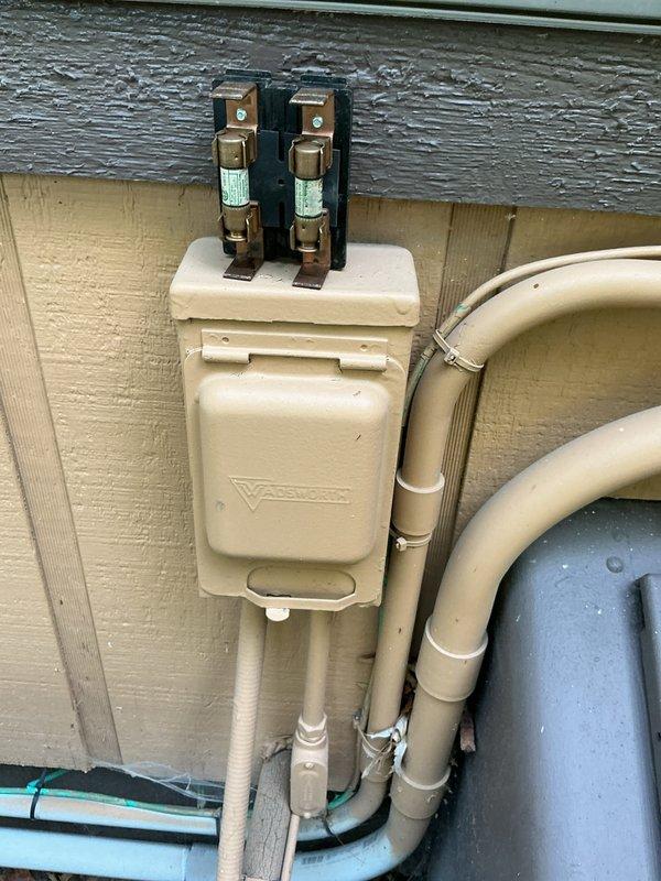 Completed annual air conditioning maintenance and tune-up on residential outdoor condenser unit. Performed comprehensive system inspection, changed air filter, and verified proper operation of all components including electrical disconnect, fuses, and refrigerant lines. Unit showed normal wear with accumulated dirt and debris on condenser coils; system operating within specifications with no issues identified.