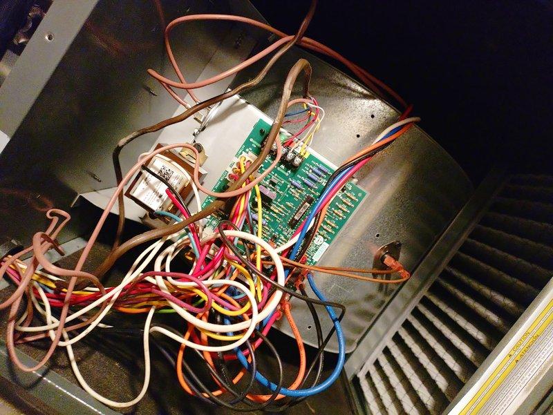 Responded to return service call on 4-year-old unit with no cooling condition. Previous visit had addressed low thermostat batteries and replaced control board due to loose blower connections. Upon arrival, system was not operating. Diagnosed failed control board—the replacement board from previous visit had malfunctioned. Removed defective PCB and installed new control board. Secured all wire connections to board terminals and verified proper seating of all connectors. Cycled system through multiple heating and cooling cycles to confirm blower motor engagement and proper operation. Verified amperage readings within manufacturer specifications and confirmed outdoor unit communication with indoor air handler. System operating normally at time of departure with no further issues detected.