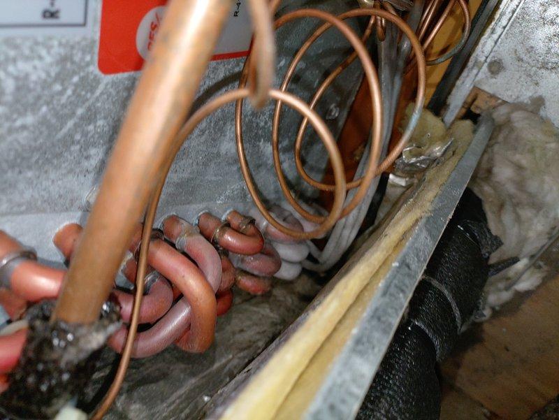 Performed comprehensive evaluation of existing furnace and air conditioning system for new homeowner. Inspected refrigerant lines, accumulator, copper piping connections, and evaporator coil assembly, documenting current condition of all components with no immediate deficiencies noted at time of inspection.