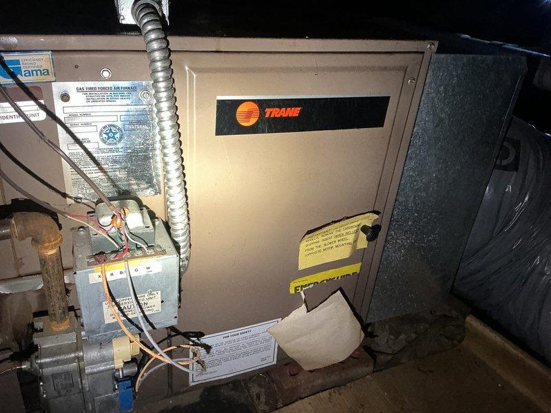 Conducted on-site evaluation of existing HVAC system located in crawl space for air conditioning replacement estimate. Inspected current Trane heating unit and associated components including gas valve assembly, electrical connections, and air handler configuration. Documented equipment condition, spatial constraints, and existing installation setup through comprehensive photography to support replacement specifications and project planning.